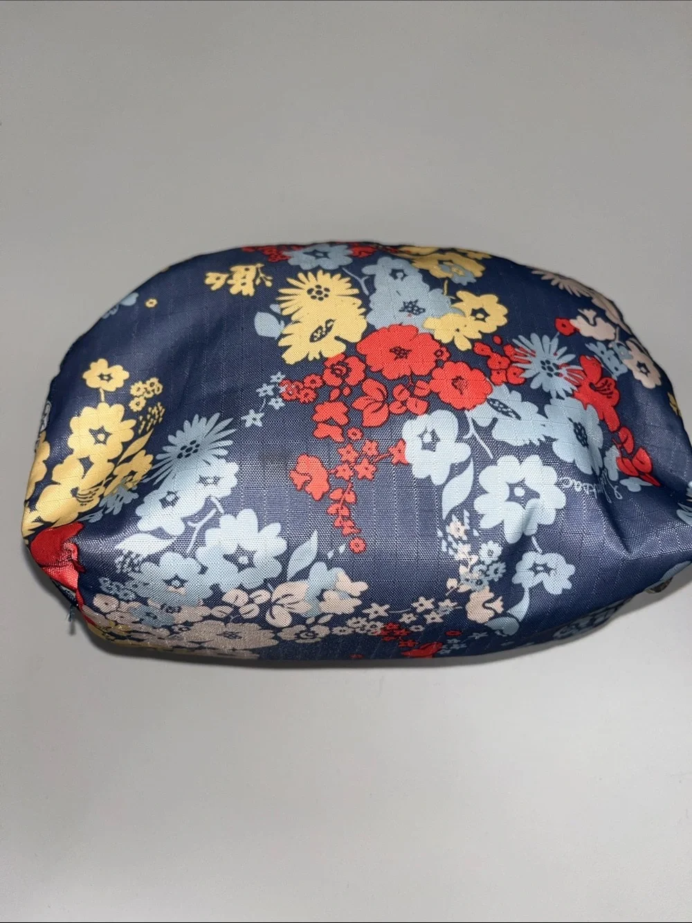 Lesportsac Blue Floral Cosmetic Pouch with Red and Yellow Accents